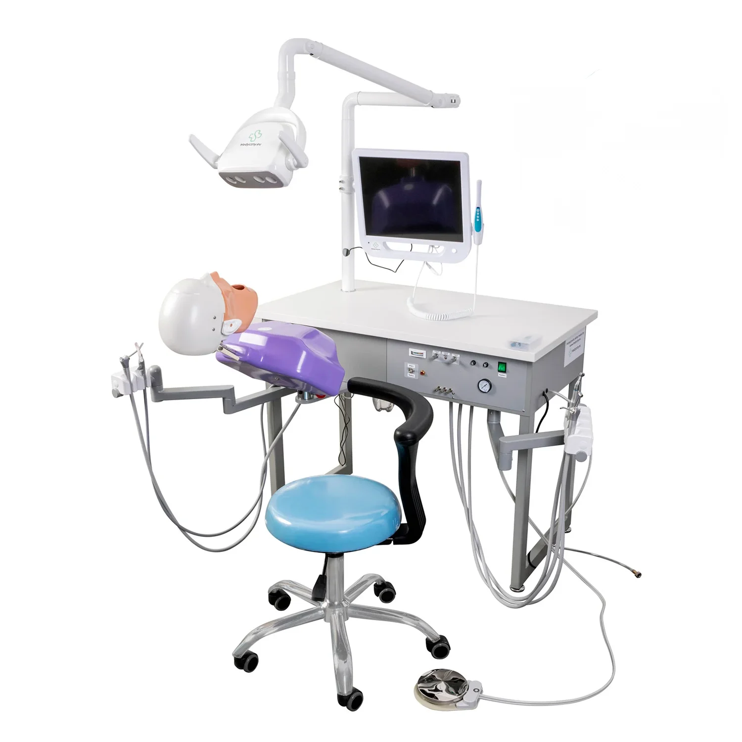 Dental operatory setup: patient chair, overhead light, monitor, and assorted dental instruments on a trolley table (clinical dental care scene).