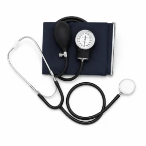 Navy blood pressure cuff with a gauge and inflation bulb, alongside a stethoscope laid out on a white surface.