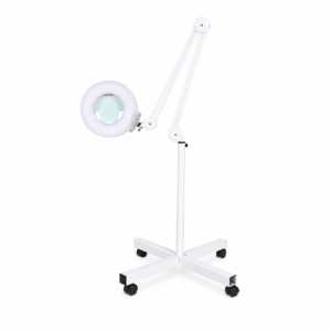 White magnifying lamp on a mobile adjustable stand with caster wheels and two articulated arms surrounding a circular lens and ring light.