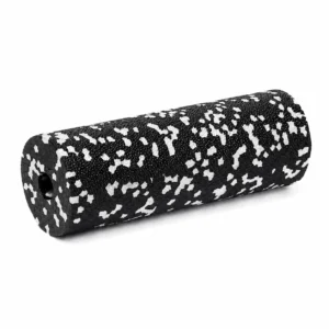 Black and white speckled foam roller resting on a white background, cylindrical exercise tool for muscle release and stretching.