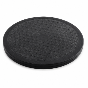 Round black circular platform with a textured diamond grid surface and a slightly raised edge (non-slip base).