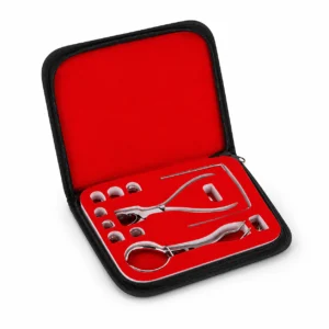 Portable dental tool kit in a red foam-lined case, showing extraction forceps and precision instruments inside a black zipper case.