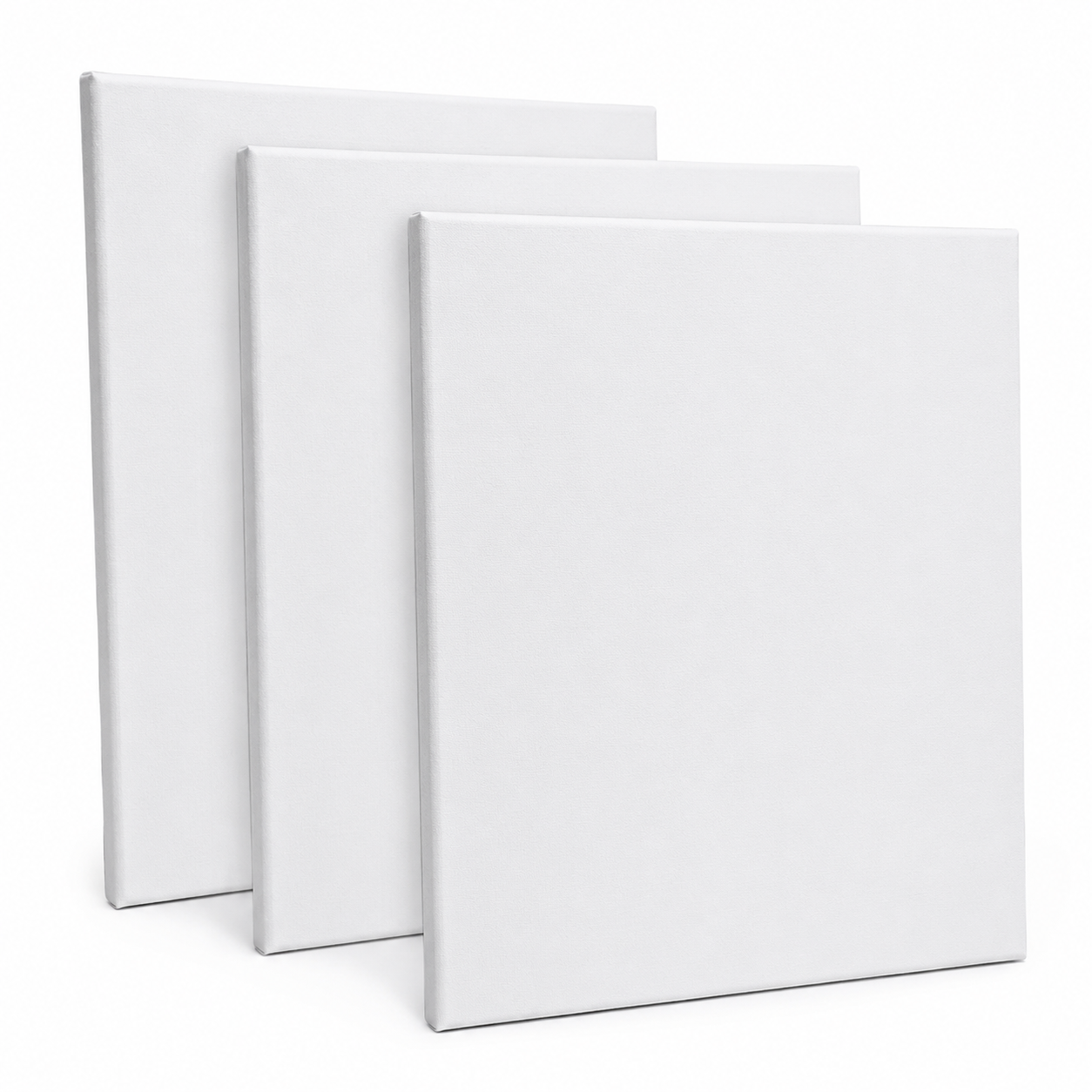 Three blank white canvases standing upright in a row, slightly angled toward the viewer