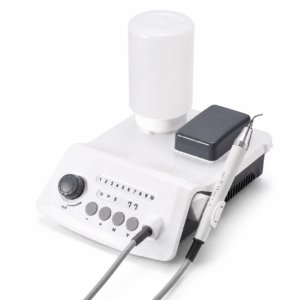 Dental ultrasonic scaler with water reservoir and handpiece for teeth cleaning.