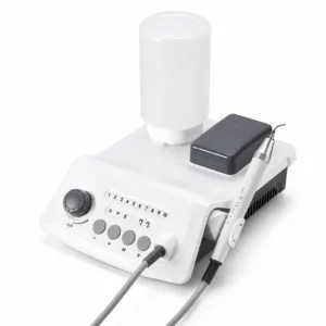Dental ultrasonic scaler with water reservoir and handpiece for teeth cleaning.