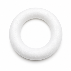 White foam doughnut-shaped ring with a hollow center and textured surface, viewed from above.