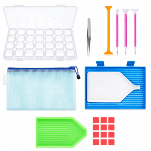 Assorted craft tools: a clear multi-compartment storage box, tweezers, assorted sculpting tools, a blue ribbed tray with white scraper, a blue zip pouch, a green wedge scraper, and red square tiles.