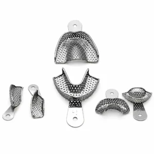 Set of perforated stainless steel dental mouthguards and mounting pieces arranged on a white background.