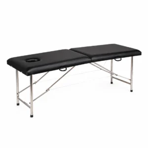 Portable massage table with black padded surface and a headrest hole; stainless steel frame on a white background.