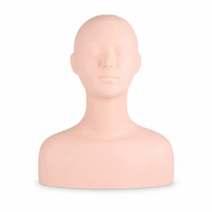 Bald plastic mannequin head with closed eyes, used for makeup or hairstyling practice.